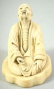 A CHINESE CARVED IVORY FIGURE of a kneeling man, mounted to an ivory base, with carved mark to base,