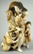 A JAPANESE MEIJI PERIOD CARVED IVORY OKIMONO of Tokiwa Gozen; mother of the great samurai general