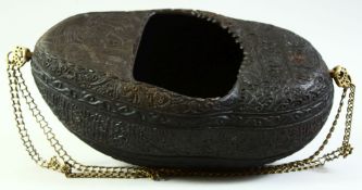 A LARGE DERVISH CARVED COCO DE MER KASHKUL / BEGGING BOWL, carved all over with figures and
