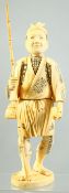A JAPANESE SECTIONAL CARVED IVORY OKIMONO of a fisherman, a rod in his right, a fish in his left,