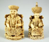 A SMALL PAIR OF CARVED IVORY EMPEROR AND EMPRESS FIGURES, each signed to base, each approx. 8cm