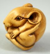 A SMALL JAPANESE WOOD CARVING OF A RAT, signed, 3.5cm.