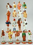 A COLLECTION OF SEVENTEEN ANGLO INDIAN COMPANY SCHOOL PAINTED CLAY FIGURES, in a wooden box, tallest