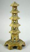 A BRASS MODEL OF A PAGODA, 19.5cm high.