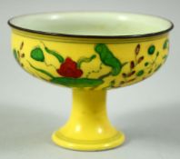 A SMALL CHINESE YELLOW GROUND SANCAI PORCELAIN STEM CUP, painted with lilies and ducks, six