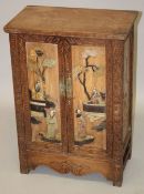 A CHINESE WOOD AND HARDSTONE ONLAID CABINET, the doors and sides decorated with figures, flora and