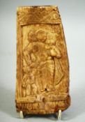 A RARE EARLY 16TH/17TH CENTURY SOUTH INDIAN BONE CARVING, depicting a mother and child, 15cm long.