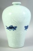 A CHINESE BLUE AND WHITE MEIPING VASE, decorated with fish and carved lotus pattern, the base with