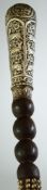A LARGE DERVISH WALKING STICK, with ornate white metal handle and ferrule; with chased decoration