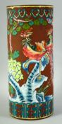 A TALL CHINESE YIXING ENAMELLED BRUSH POT, the body enamelled with exotic birds and native flora,