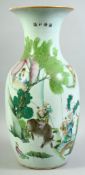 A LARGE CHINESE PORCELAIN VASE, painted with a figure riding an oxen together with other figures