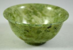 A CHINESE SPINACH GREEN JADE BOWL, 10cm diameter.