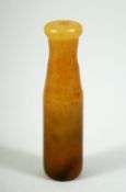 A CHINESE JADE CIGARETTE HOLDER, 2.6in long.