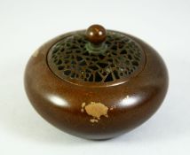 A CHINESE BRONZE GOLD SPLASH CENSER, 3in diameter.