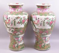 A LARGE PAIR OF CHINESE FAMILLE ROSE / VERTE PORCELAIN VASES, painted with panels of female