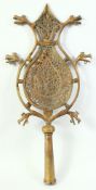 AN ISLAMIC BRASS OPENWORK ALAM, 50cm high.