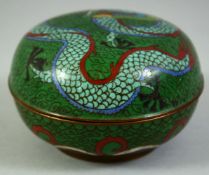 A CHINESE CLOISONNE CIRCULAR BOX AND COVER, the cover decorated with a dragon, 11cm diameter.