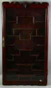 A CHINESE HARDWOOD SNUFF BOTTLE WALL DISPLAY CABINET, 83.5cm x 46cm.