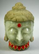 AN INDIAN CARVED JADE / GREEN HARDSTONE BUDDHA HEAD, onlaid with semi precious stones and gilt
