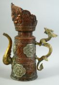 A FINE TIBETAN BRASS AND SILVER PANELLED OPENWORK EWER, with engraved and chased decoration