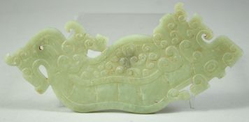 A CHINESE CARVED JADE ARCHIAC DRAGON AMULET, 17.5cm long.