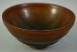 A CHINESE FUR GLAZE POTTERY CUP, 9cm diameter.