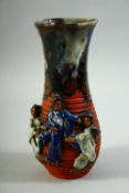 A JAPANESE SUMIDA POTTERY VASE, decorated with female figures in relief, 22cm high.