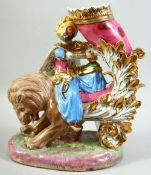 A EUROPEAN PORCELAIN FIGURE OF AN OTTOMAN SULTAN, seated upon a lion formed cornucopia, 32.5cm