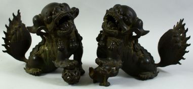 TWO LARGE 18TH CENTURY BRONZE DOGS OF FO, each approx. 21cm high, 25cm long.