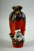 A JAPANESE SUMIDA POTTERY VASE, decorated with a female figure and boy in relief, the vase with