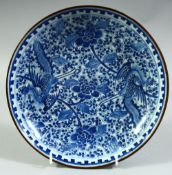 A CHINESE BLUE AND WHITE PORCELAIN DISH, painted with exotic birds against floral pattern, six