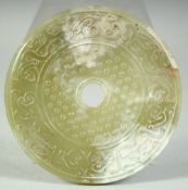 A LARGE CHINESE CARVED NEPHRITE JADE ARCHAIC DISK, 12.5cm.