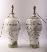 A GOOD PAIR OF CHINESE FAMILLE VERTE PORCELAIN VASE LAMPS, undrilled, painted with birds amongst