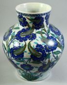 A LARGE 20TH CENTURY TURKISH IZNIK BULBOUS VASE, the body painted with foliate decoration, 38cm