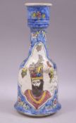 A 19TH CENTURY PERSIAN QAJAR POTTERY HUQQA BASE, painted with two portrait panels, 29cm high.
