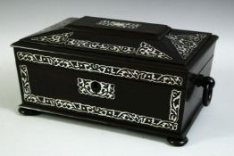 A FINE MOTHER OF PEARL INLAID EBONY CASKET, 23.5cm long.