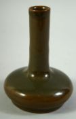 A CHINESE OLIVE GREEN GLAZE VASE, with impressed mark to base, 13.5cm high.