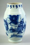 A GOOD CHINESE BLUE AND WHITE PORCELAIN JAR / VASE, decorated with various figures in an outdoor