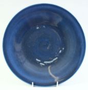 A CHINESE BLUE GLAZE PORCELAIN DISH, 28.5cm diameter.