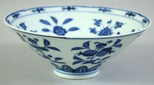 A CHINESE BLUE AND WHITE PORCELAIN FUNNEL SHAPE BOWL, decorated to interior and exterior with floral