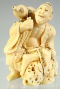 A SMALL JAPANESE CARVED IVORY OKIMONO of a figure with a gourd shape water flask on his shoulder,