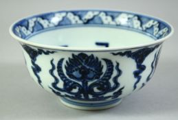 A CHINESE BLUE AND WHITE PORCELAIN BOWL, the interior decorated with characters, the exterior with