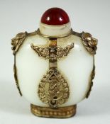 A CHINESE SILVER-METAL OVERLAID WHITE JADE-LIKE GLASS SNUFF BOTTLE & STOPPER, 3.5in high.