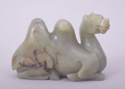 A CARVED JADE MODEL OF A CAMEL, 9cm long.