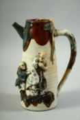 A GOOD JAPANESE SUMIDA COFFEE POT AND COVER, decorated with two partly glazed figures in relief,
