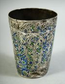 A 19TH CENTURY INDIAN ENAMELLED BEAKER, possibly Lucknow, 10cm high.