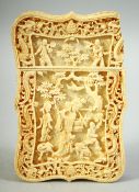 A CHINESE CANTON CARVED IVORY CARD CASE, carved with female figures and animals beneath a tree