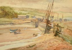 J. W. Williams (19th/20th Century), Boats moored in a harbour at low tide, watercolour, signed, 6.5