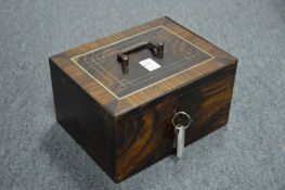 A cast iron strong box.