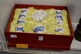 A boxed Japanese sake set.